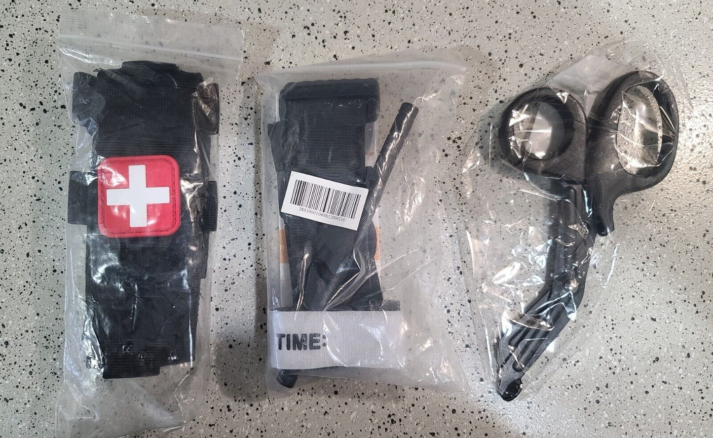 BLACK Tourniquet Pouch, With Trauma Shears and Rapid One Handed Tourniquet.